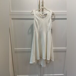 White Tommy Hilfiger dress size 6. Never worn with tags still on.